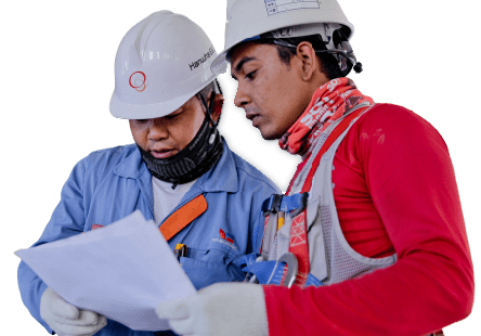 Engineers reviewing site drawings