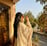 a woman in a white dress and a white dress