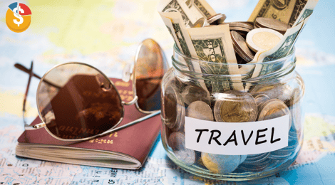 a jar of money with a passport and sunglasses