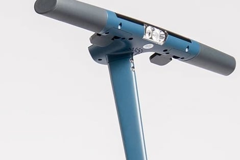 a scooter with a blue handlebar and a blue handlebar