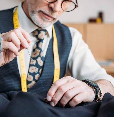 Man using hand sewing needles