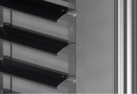 a close up of a metal rack with several shelves