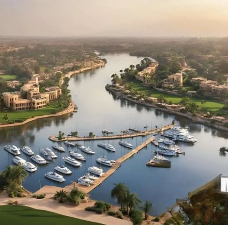 صف يخوت فاخر بجوار وحدات سكنية مطلة على النيل في مشروع جريان