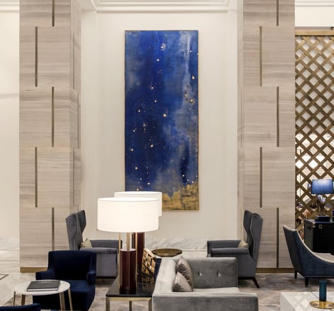 Bespoke painted wall installation by Lumai Studio expressing movement and place in St. Regis Astana