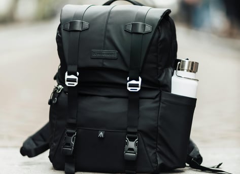 a backpacker's backpacker with a water bottle