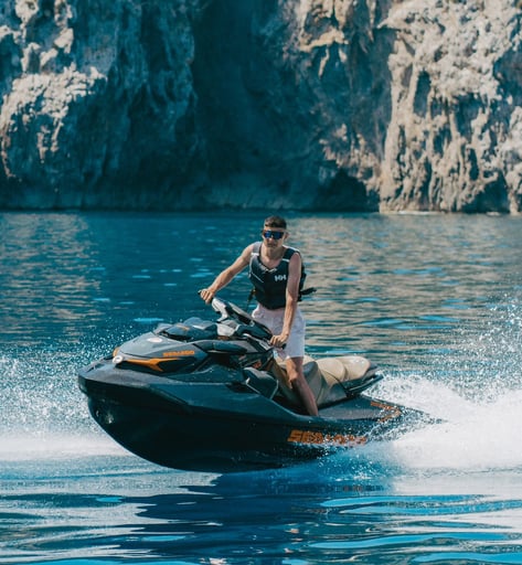 Tourist enjoying a guided jet ski tour along the Mallorca coast