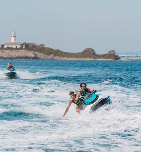 Couple enjoying jet ski ride in northern Mallorca