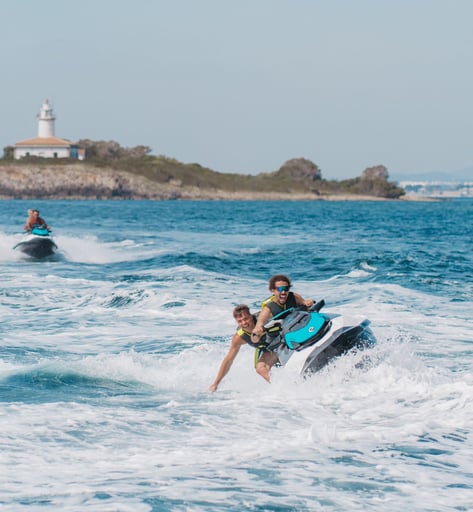 Couple enjoying jet ski ride in northern Mallorca