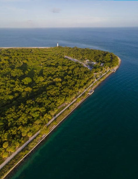 aerial view of seawall on peninsula