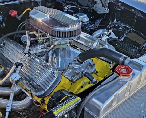 A engine compartment with complete detailing from D and P auto detailing