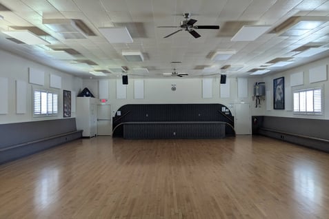 Large interior room & stage at American Legion Post 172 meeting hall. It is available to rent.
