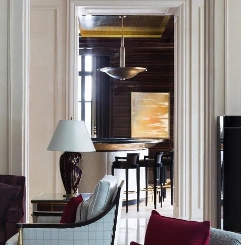 Curated painting by Lumai Studio echoing the tone and materiality of The Woodward Geneva bar