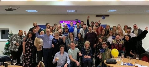 Image of a large group of Tim's friends and family at one of his quizzes.