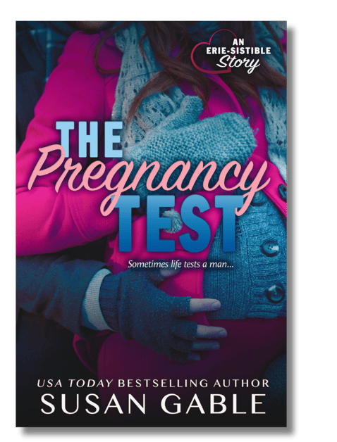 Pregnancy Test cover - pregnant woman in pink winter coat, man cradling her baby bump with hands