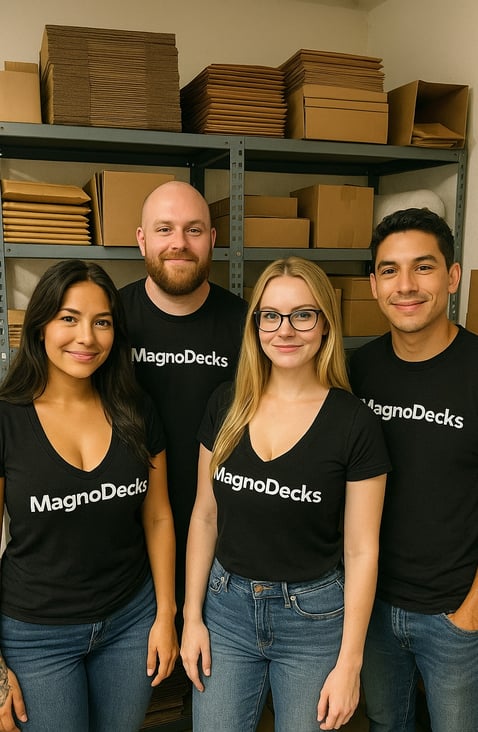 MagnoDecks team packing Magic and Pokémon card orders in shipping area