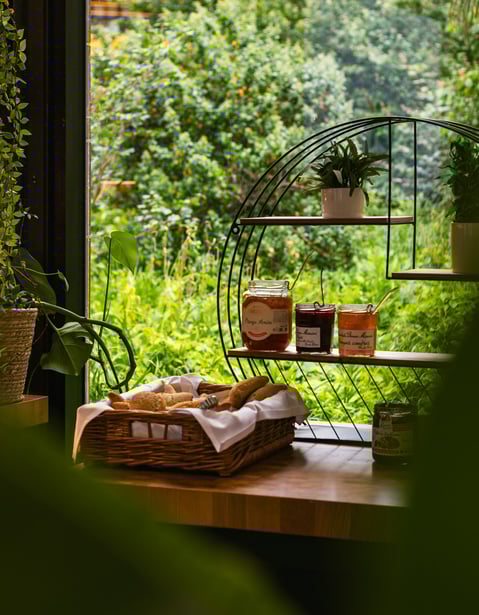 a table with a basket of food and a basket of food