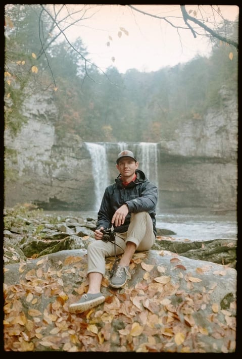 Photo by Lucas Wiman on film of Nate Bowery camera in hand at Fall Creek Falls State Park.