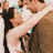 bride and groom smiling at each other during their first dance