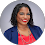 a woman in a red top and blue blazer jacket