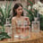 gold vase on brown wooden table