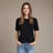 woman wearing black crew-neck shirt