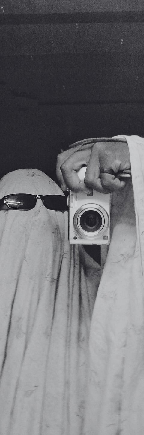 image of someone dressed as a ghost/ghoster