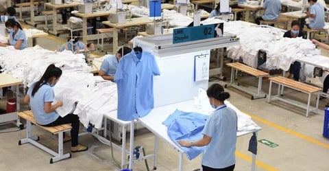 Finished clothing line prepared for shipping from Canadian facility
