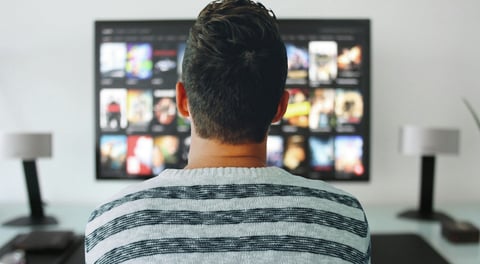 man watching tv .