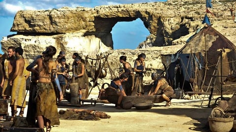 Dothraki village in front of the Azure Window from episode 1, season 1 of Game of Thrones.