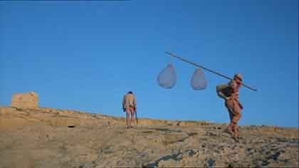 A man holding a fishing net.