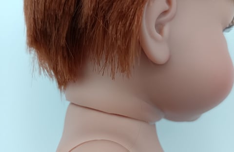 Dolls hair badly cut