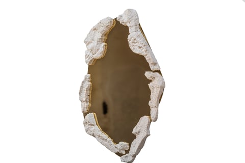 Sculptural Collectible design Wall Mirror in travertine and polished brass.