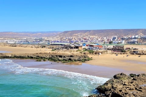 a beach with a view of taghazout