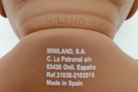 Marking on the back of a 32cm Miniland doll