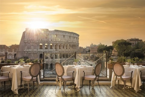 a restaurant with a view of the roman collisco