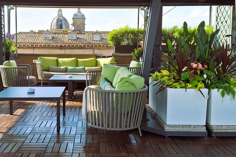 a patio with a couch and a table