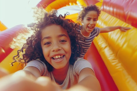 Kids playing in bouce house