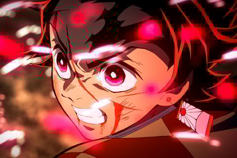 Tanjiro lutando contra demônios em Demon Slayer