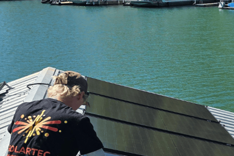SolarTec installer setting panels at Norris lake