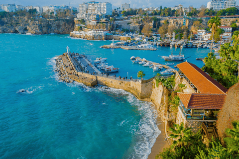 a view of a beach with boats and buildings