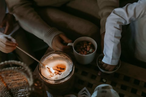 Cozy living: Family gathered for a heartfelt ritual, sharing warmth, connection, and meaningful bond