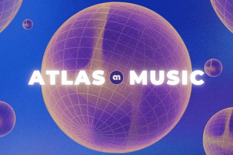 a large ball of music with a blue sky in the background
