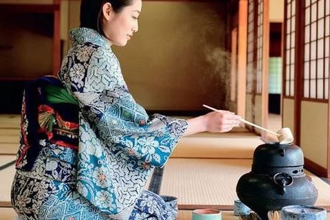 Tea ceremony in Japan on tatami and kimono
