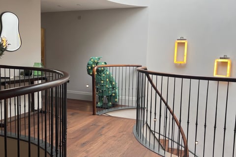 A coffee bean colour oak plank in an abstract hallway