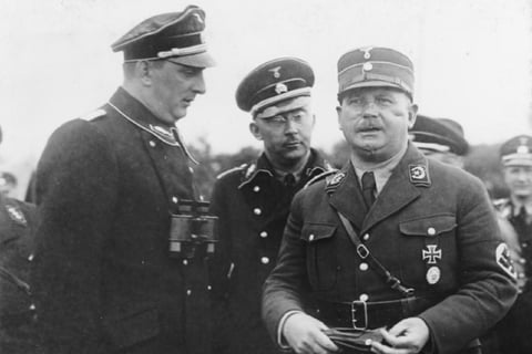 "Hitler with Sturmabteilung (SA) Brownshirts during Nazi Germany’s rise to power"