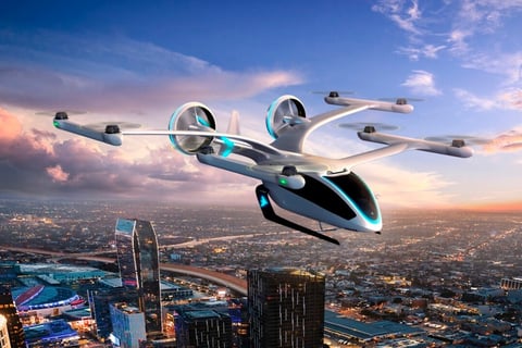 A city with a drone transporting people in the sky.