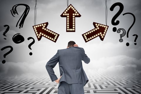 Image of a person who is overwhelmed with too many questions, answers and decisions
