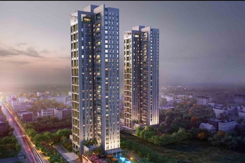 a tall building with a pool and a swimming pool
