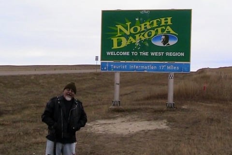 Rom (aka OpaDopa) stands at the border of North Dakota on a cold, autumn afternoon.