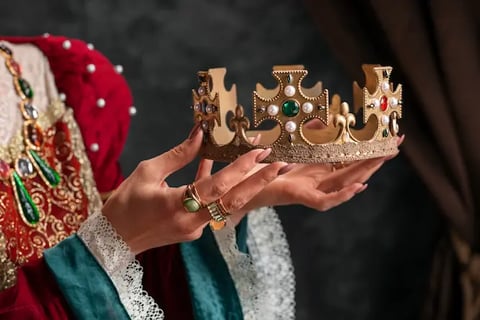 A Woman Holding the King's Royal Tiara